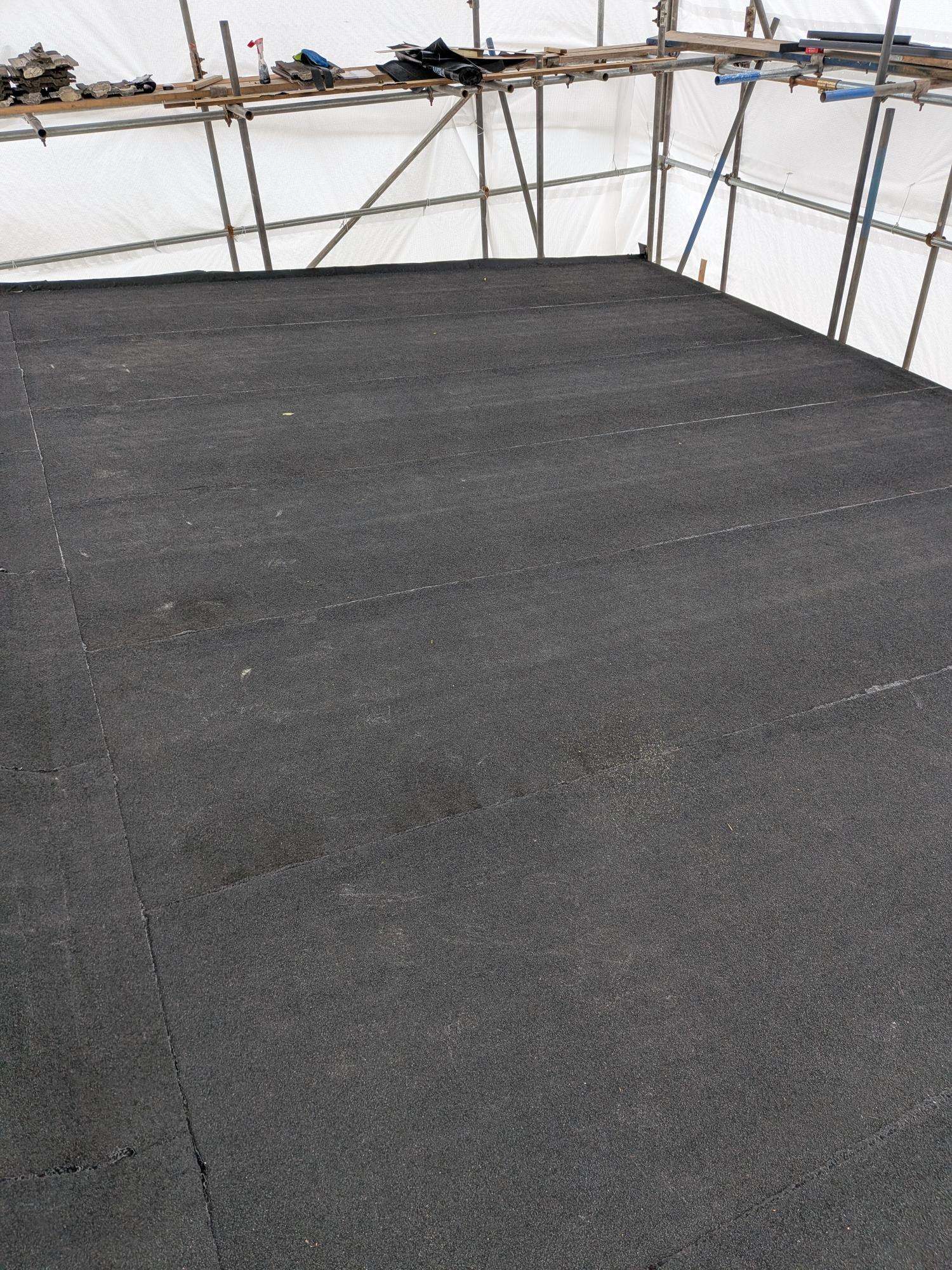 Seamless application of high-tensile underlay across a large structural flat roof deck in the TQ12 area