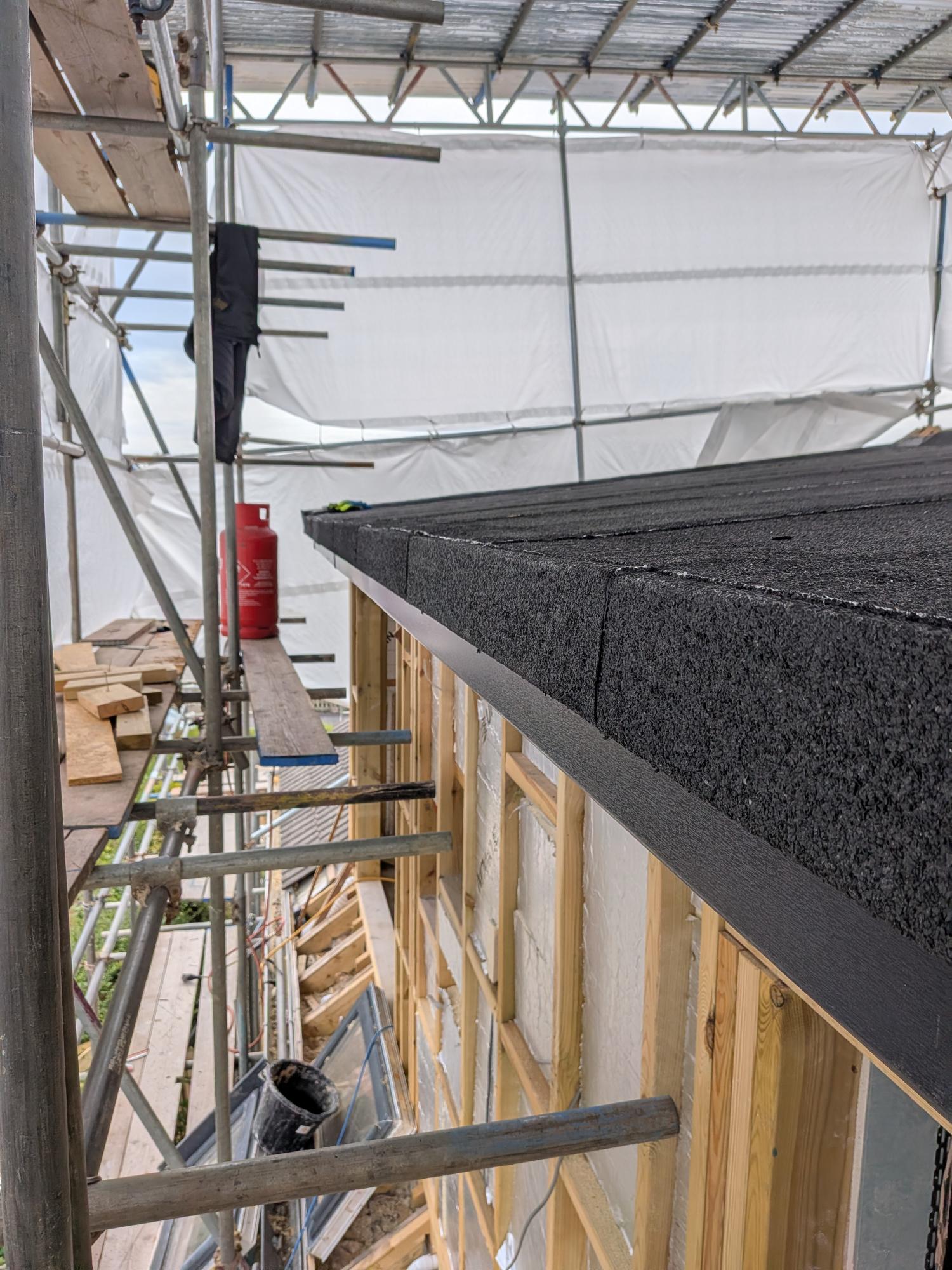 Installation of professional flat roof edge trims and drip details on a new timber frame extension in Ipplepen, TQ12