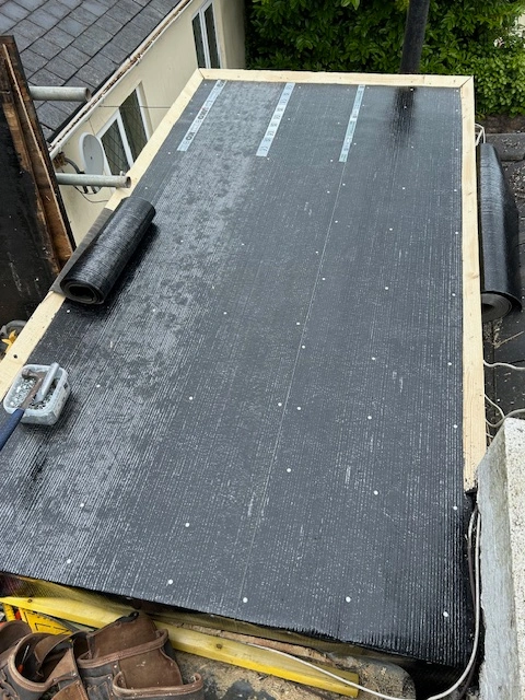 image of the first felt layer being applied.